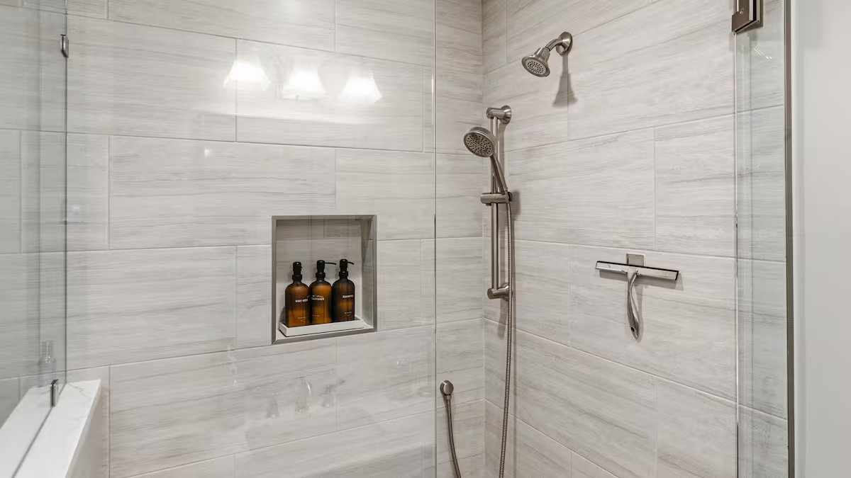 Tiled walk-in shower with floor-to-ceiling glass